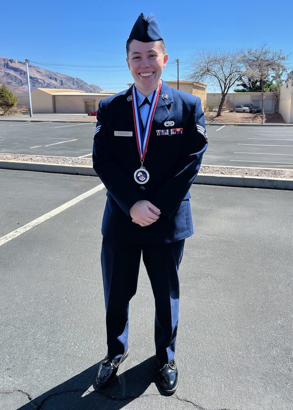 Mckenzie smiling in her military uniform